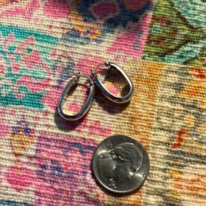 Medium size sterling silver hoop earrings.